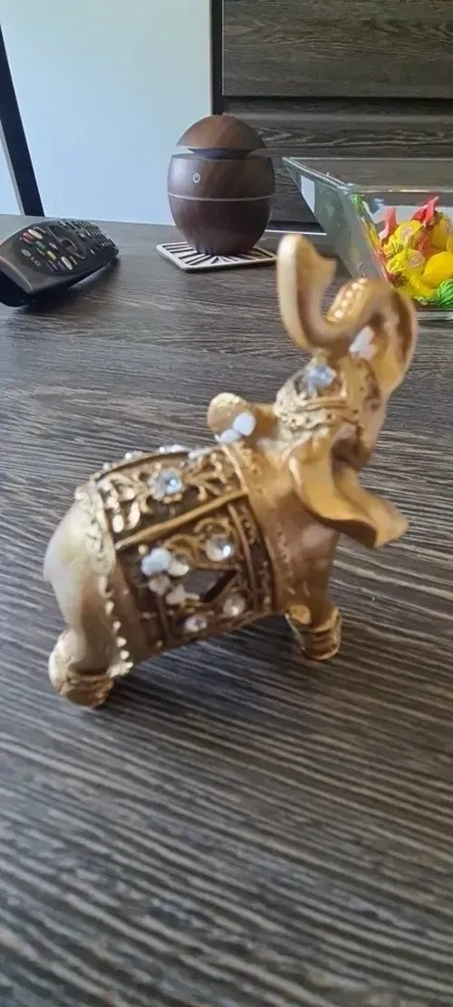 Golden Resin Elephant Statue with Elegant Trunk - Lucky Wealth Figurine Home Decor photo review