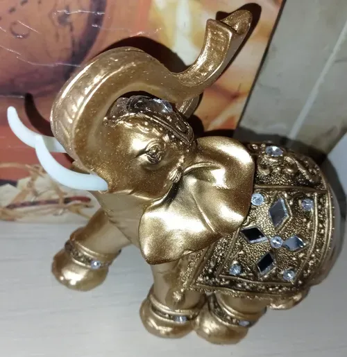 Golden Resin Elephant Statue with Elegant Trunk - Lucky Wealth Figurine Home Decor photo review