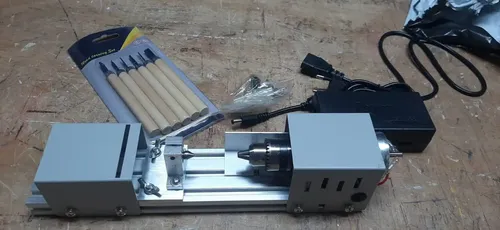 Mini Lathe for Wood and Metal with Polishing and Cutting Capabilities(100W, 2000-8000RPM) photo review