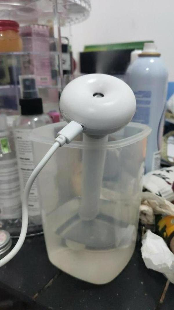 Portable Mini Water Bottle Caps Humidifier photo review