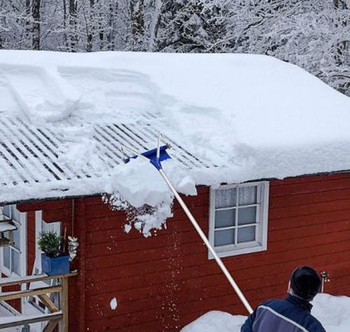 Snow Sweeping Tools On The Roof