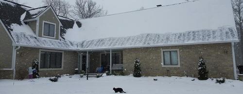 Snow Sweeping Tools On The Roof photo review