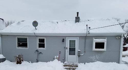 Snow Sweeping Tools On The Roof photo review