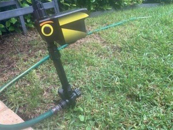 Solar Powered Motion Activated Animal Repellent Garden Sprinkler photo review