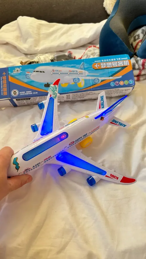 Toy Airplane Model With Lights And Music For Kids photo review