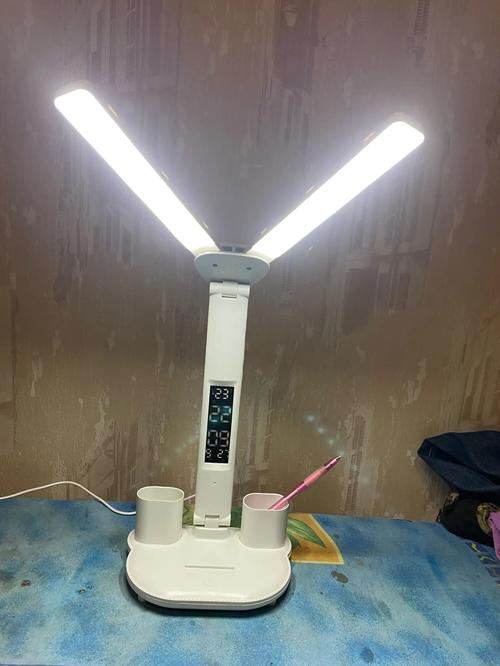 USB Rechargeable Dimmable LED Clock Table Lamp with 2 Heads and 180-Degree Rotation for Reading, Studying, and Night Light photo review