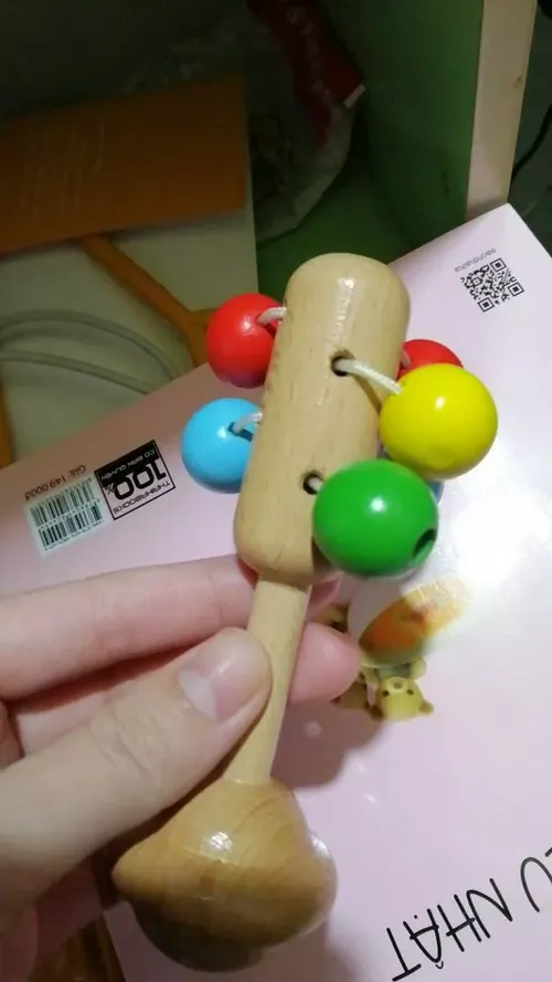 Wooden Rattles for Babies - Educational Toys with Sensory Balls photo review